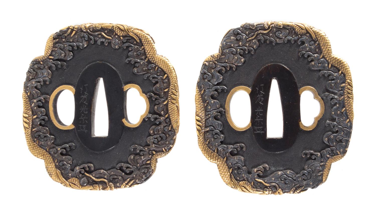 Two Gilt Decorated Iron Tsubas Height of taller 3 inches. — 19TH CENTURY