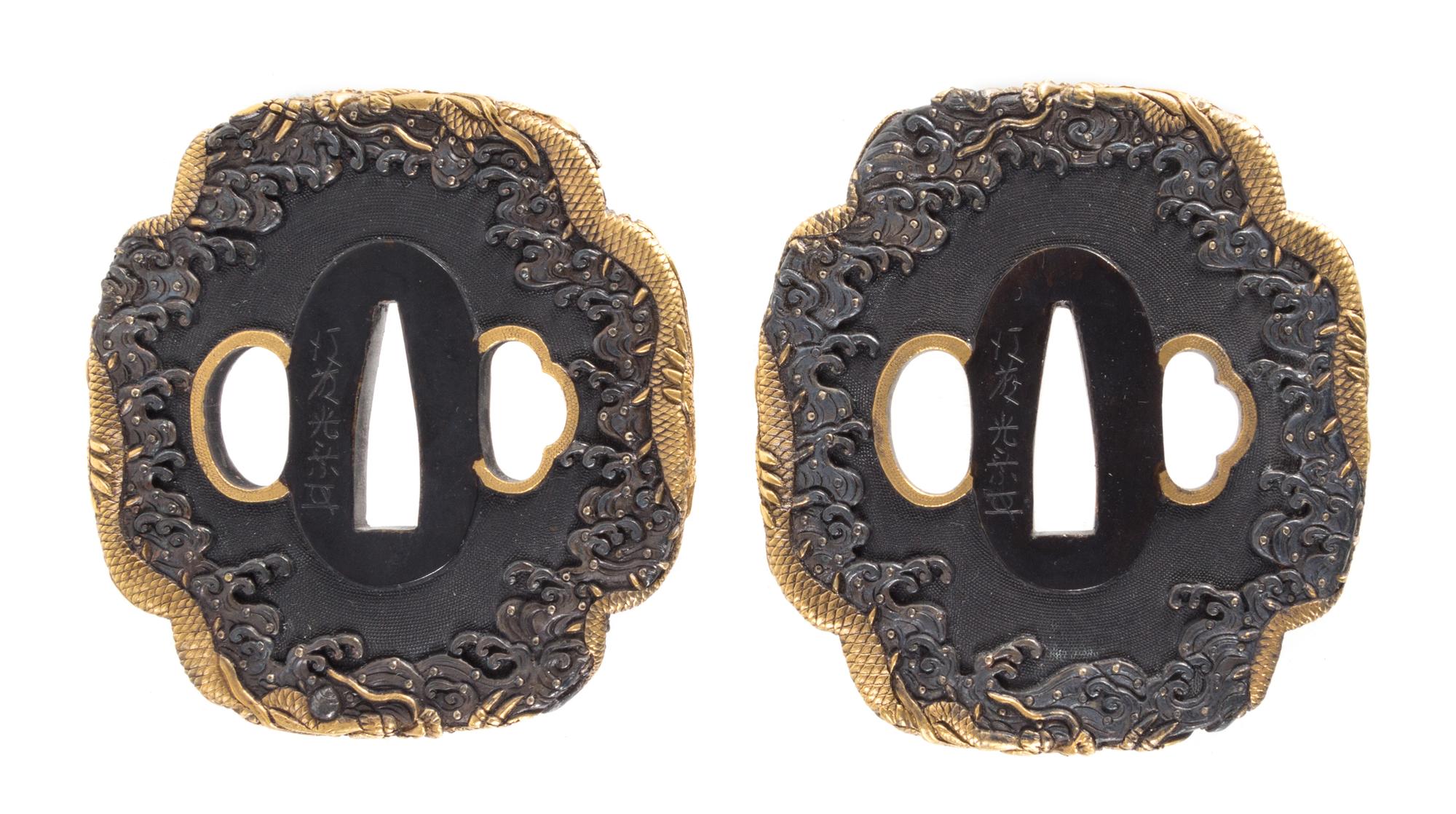 Two Gilt Decorated Iron Tsubas Height of taller 3 inches. — 19TH CENTURY