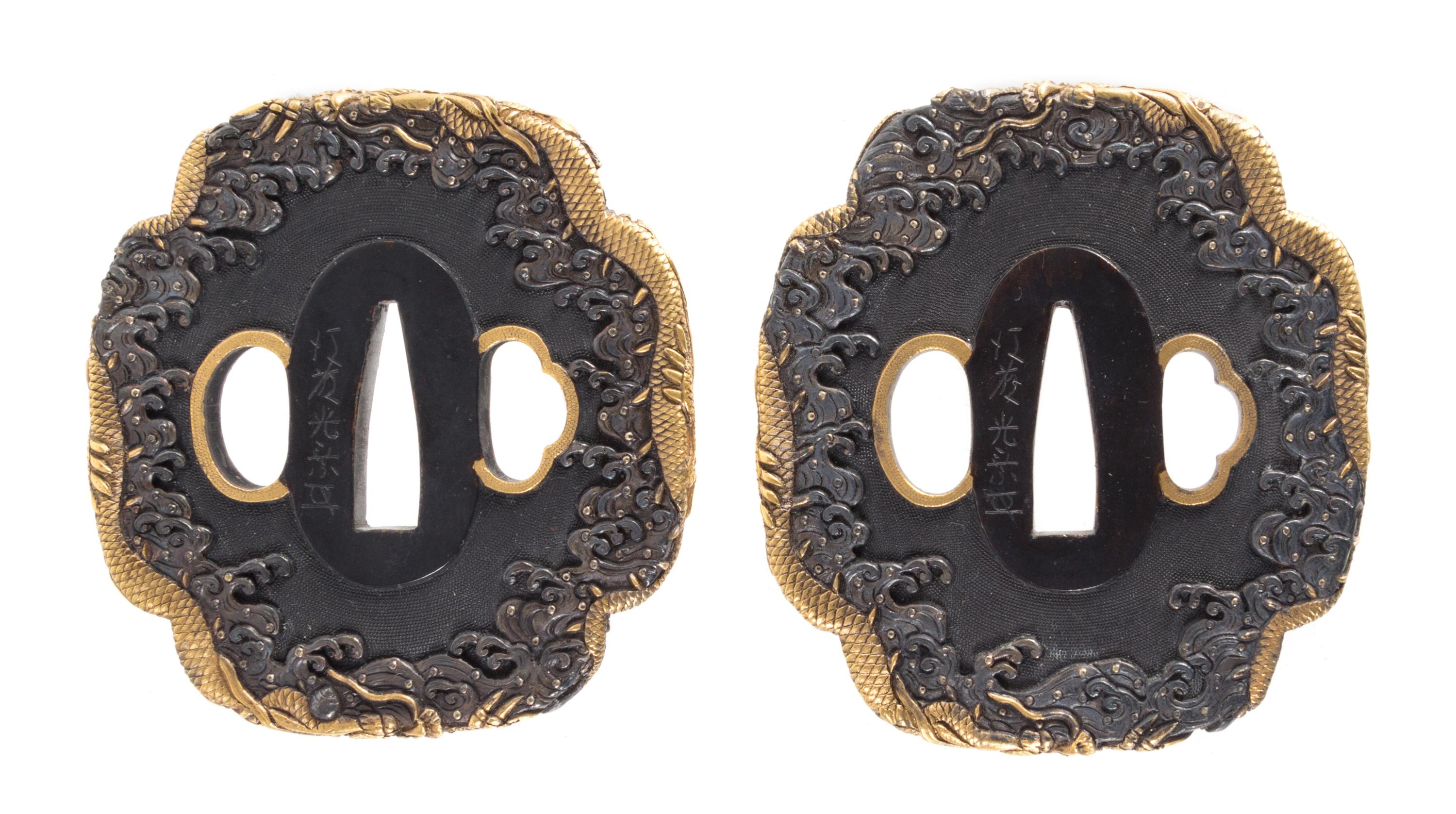 Two Gilt Decorated Iron Tsubas Height of taller 3 inches. — 19TH CENTURY