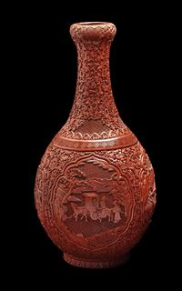 A Chinese Carved Red Lacquer Bottle Vase
