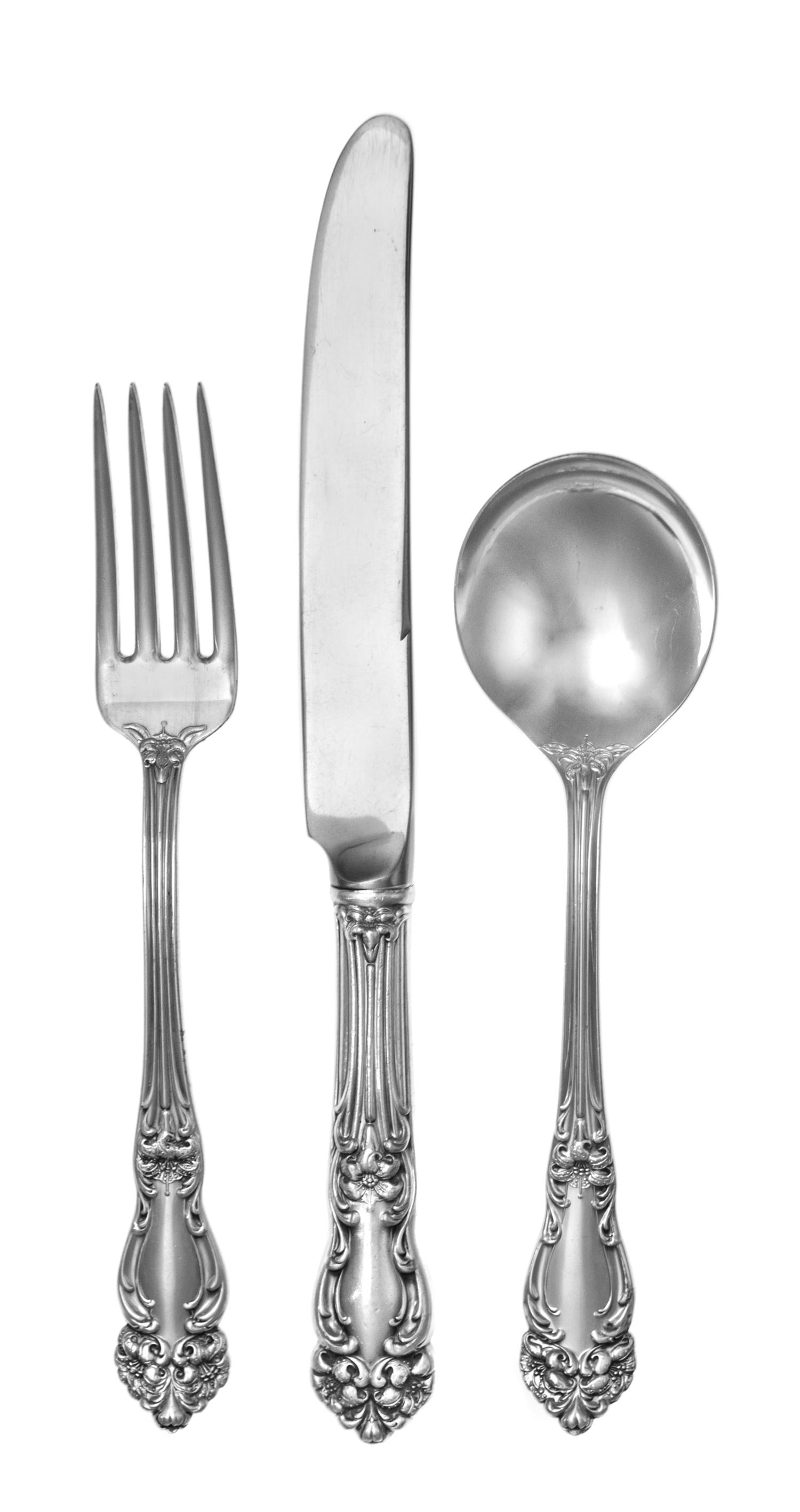 An American Silver Flatware Service , Reed and Barton, Taunton, MA , Amaryllis pattern comprising: 12 dinner knives 12 butter spreaders