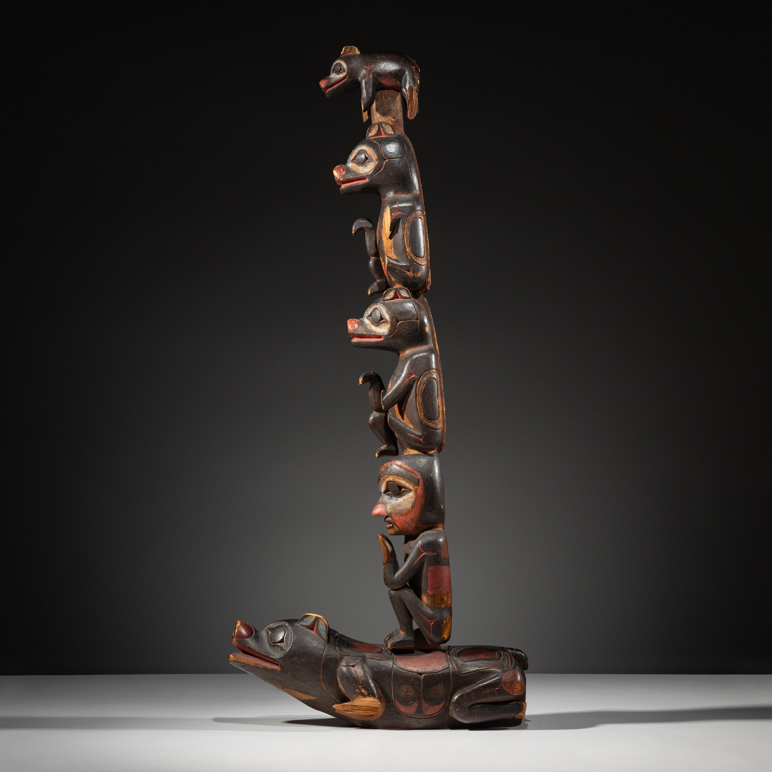 Haida Carved Totem Pole and Bear Cub
