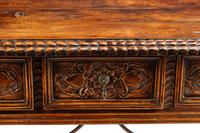 A Spanish Baroque Style Iron Mounted Trestle Table
