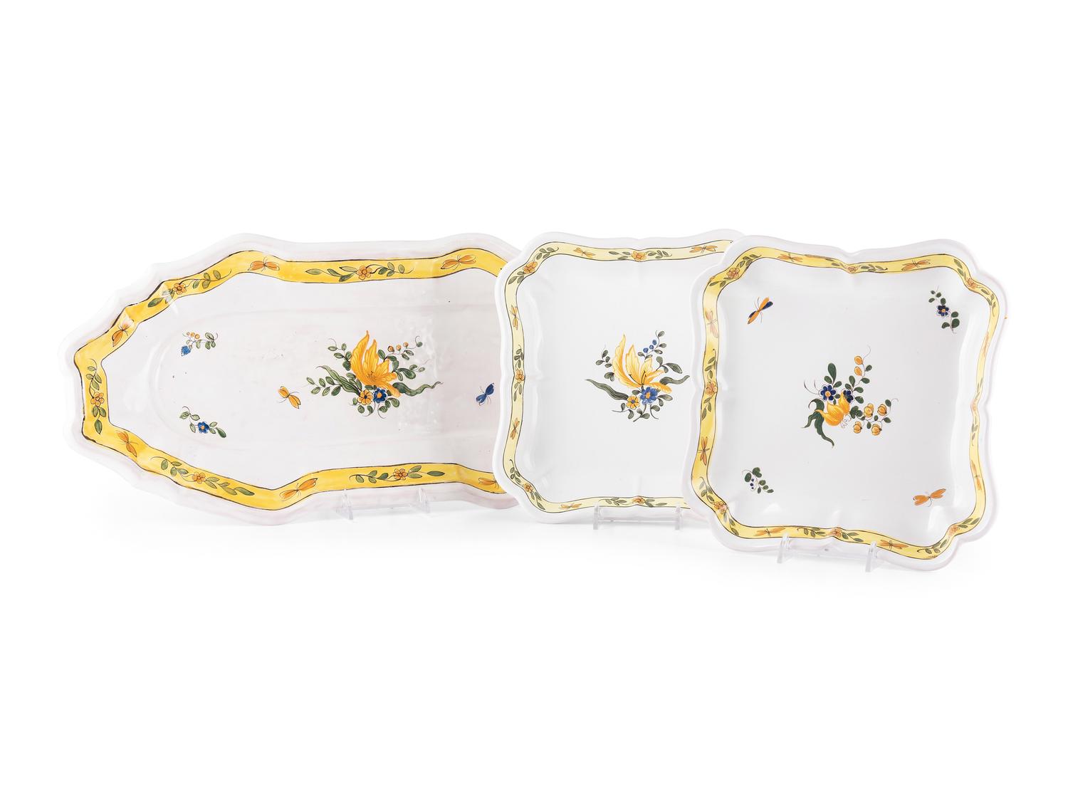 A French Hand Painted Faience Dinner Service