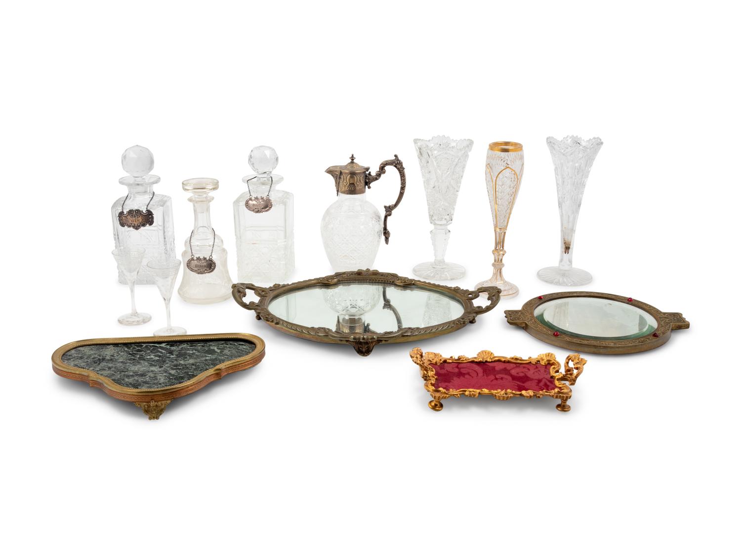 Four Gilt Metal Mounted Table Plateaus and a Group of Cut Glass Articles