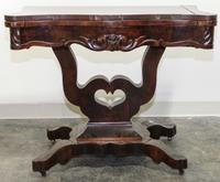 An American Empire Mahogany Game Table Height 29 x width 35 1/4 x depth 18 1/2 inches (closed). — 19TH CENTURY