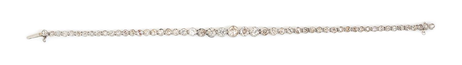 An Art Deco Platinum and Diamond Line Bracelet, 5.90 dwts.