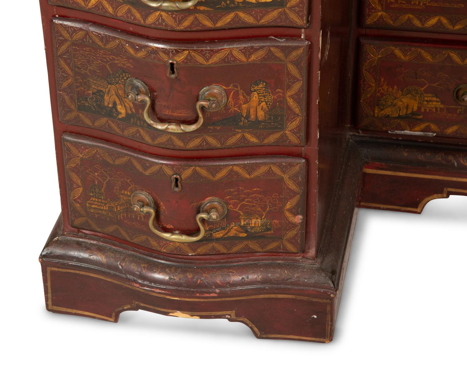 A George III Style Red and Gilt Japanned Knee-Hole Desk