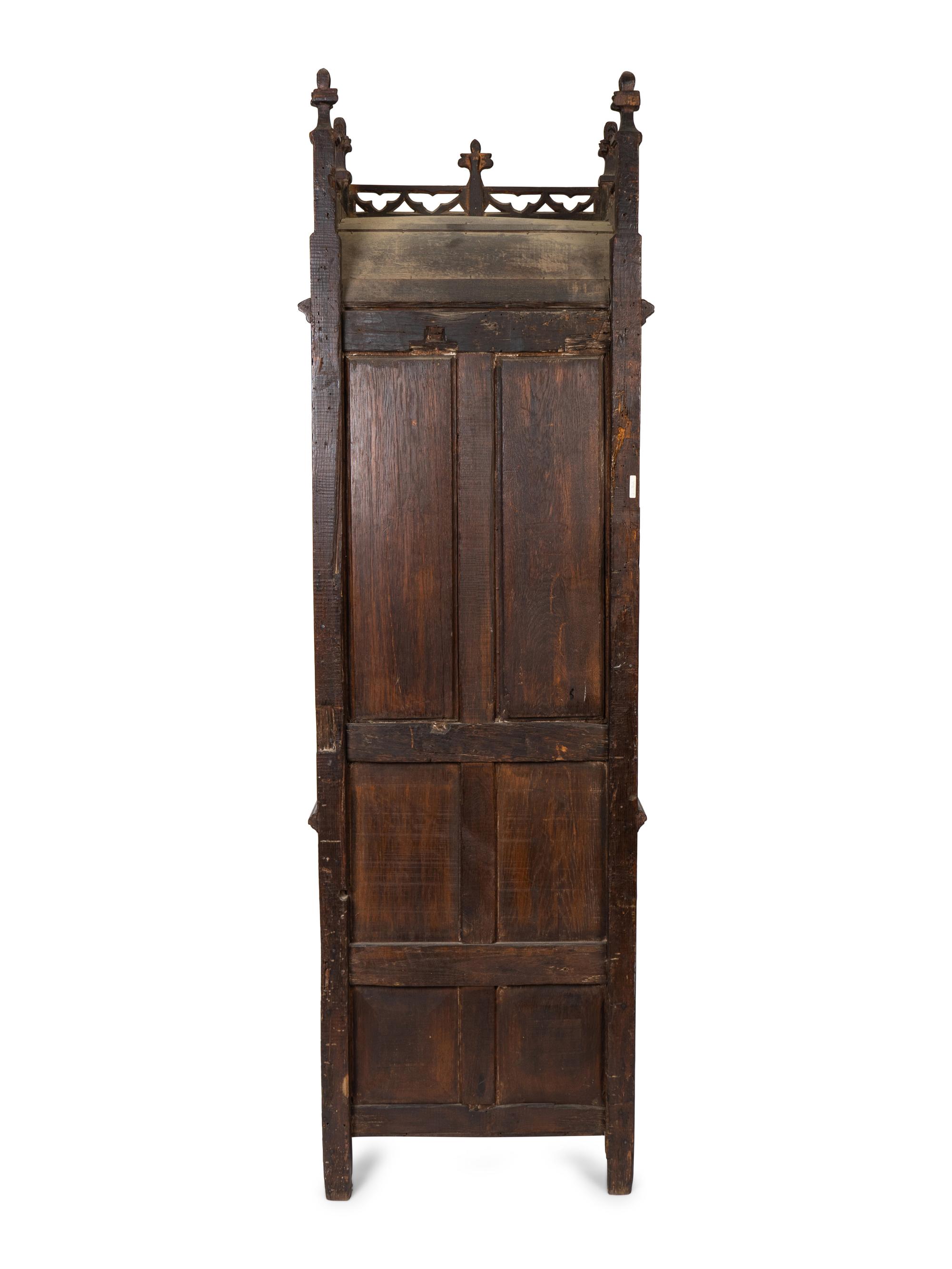 A Jacobean Style Carved Oak Bishops' Chair — 19TH CENTURY