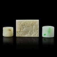 Two Chinese jade and jadeite thumb rings and a carved jade belt plaque 扳指及玉牌饰一组三件 Ming to Qing dynasty ???