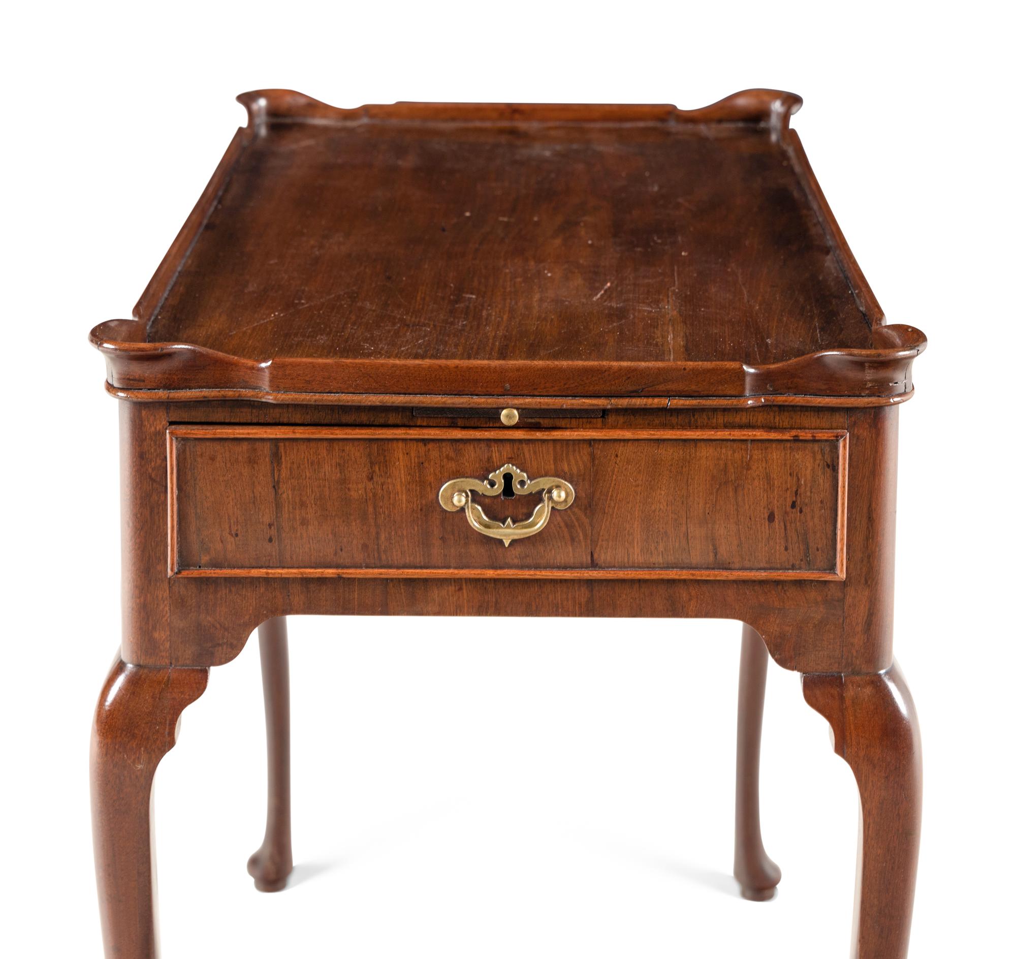A George III Walnut Tea Table