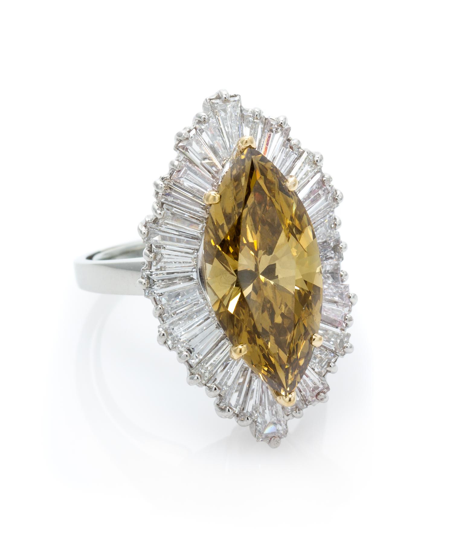 A Platinum, Yellow Gold, Treated Fancy Dark Brown-Yellow Diamond and Diamond Ring, 9.10 dwts.