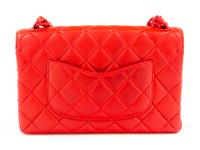 A Chanel Red Lambskin Quilted Flap Bag, 10" x 7" x 2.75"; Strap drop: 19".