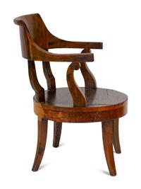 A Continental Barrel-Back Armchair