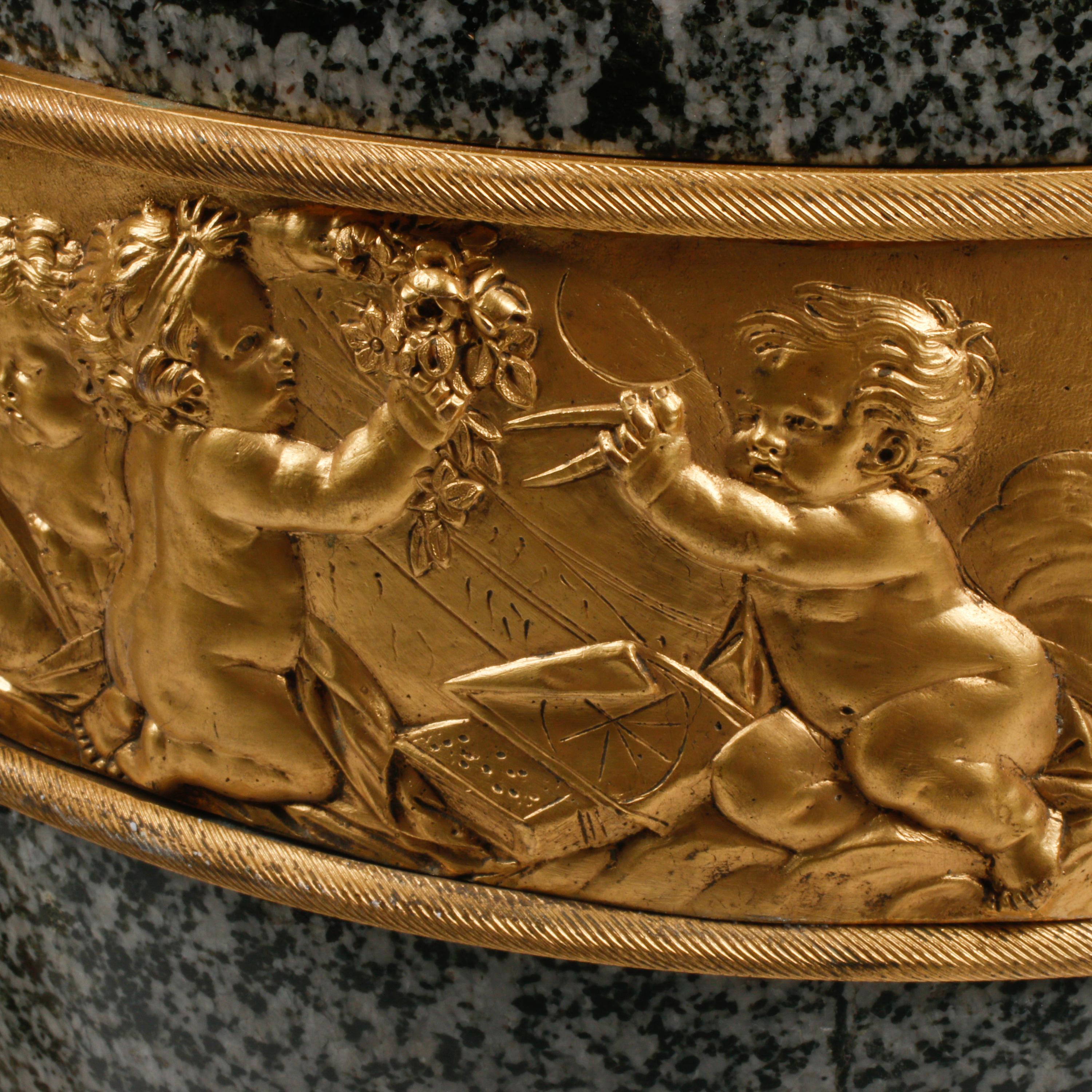 A Pair of Large French Gilt Bronze Mounted Marble Urns