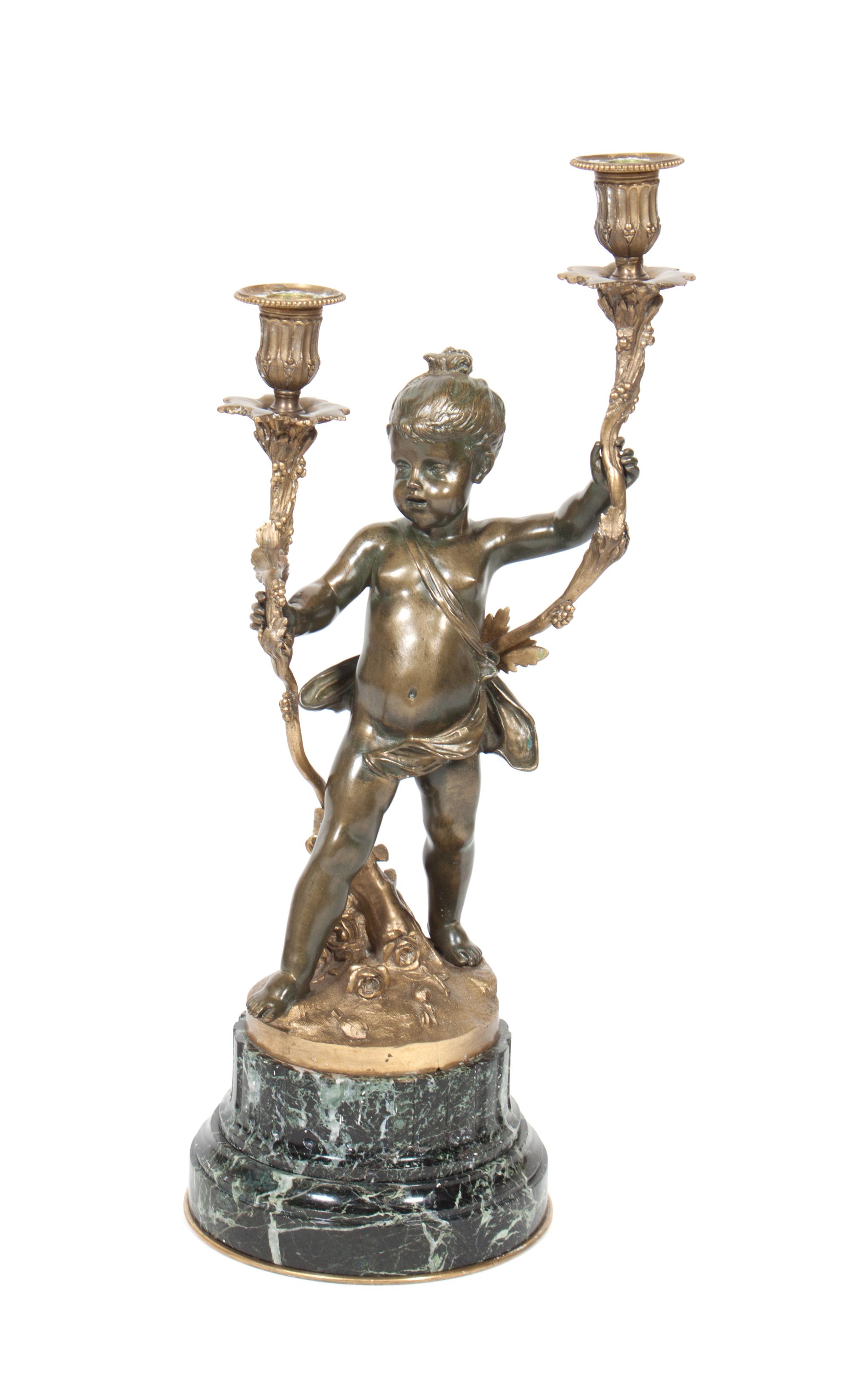A French Gilt Bronze and Marble Two-Light Figural Candelabra Height overall 20 3/4 inches. — 19TH CENTURY