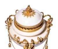 A Pair of Late Louis XVI Gilt Bronze Mounted White Marble Cassolettes