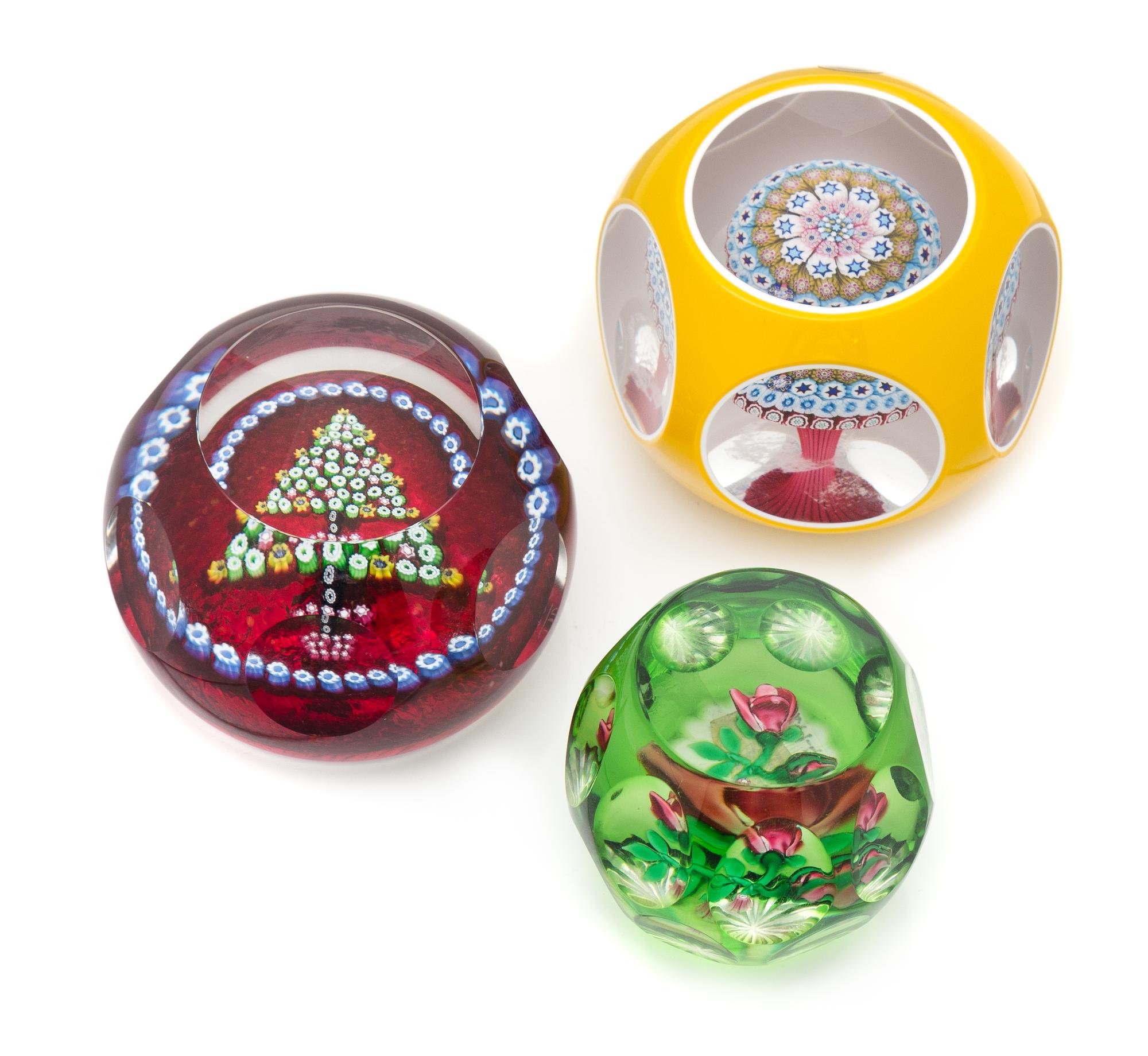 Three Faceted Glass Paperweights Diameter of largest 3 inches