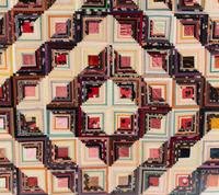 A Log Cabin Pattern Pieced Silk and Satin Quilt