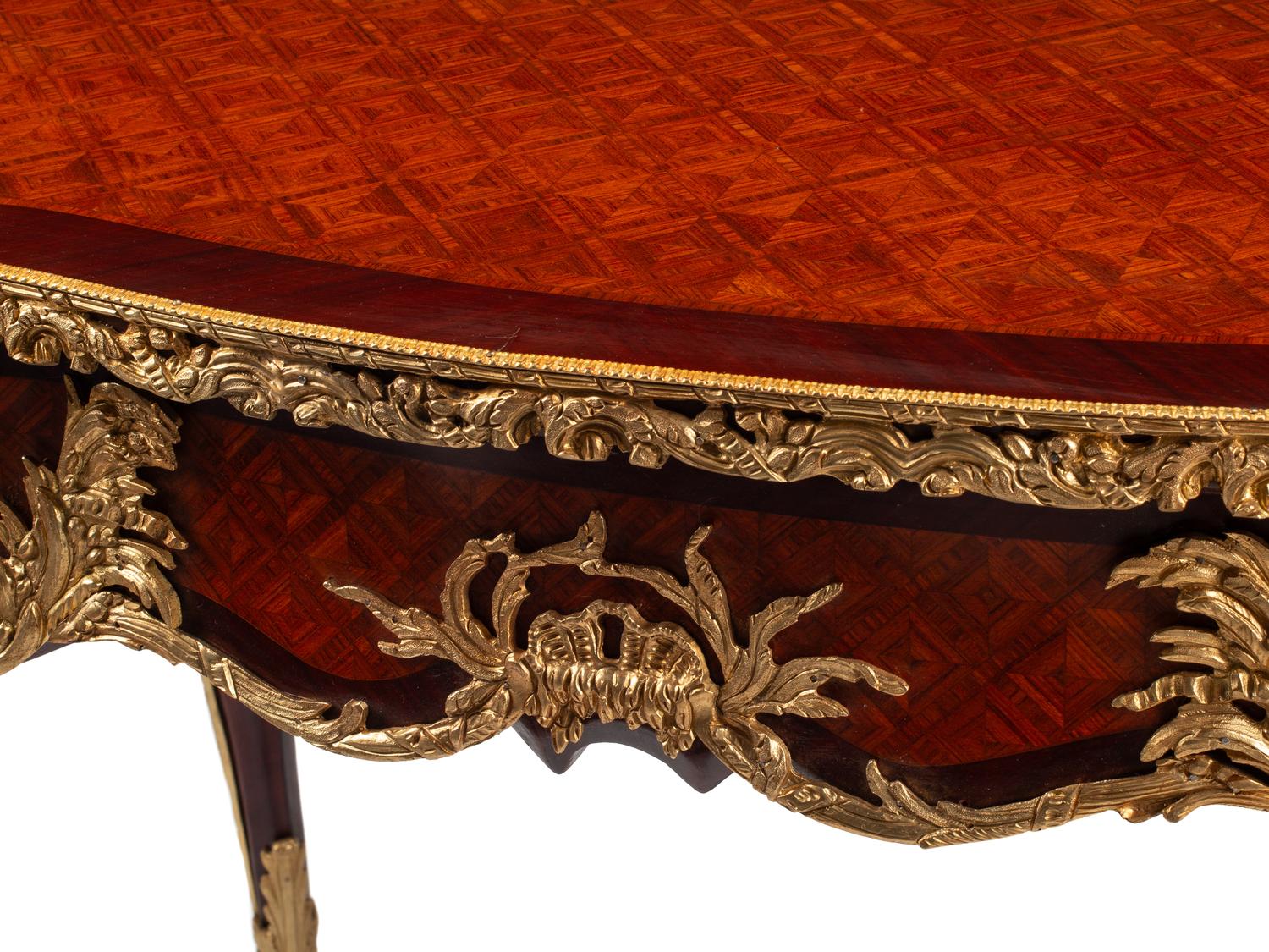 A Louis XV Style Gilt Bronze Mounted Parquetry Bureau Plat