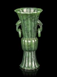 A Carved Spinach Jade Gu Vase