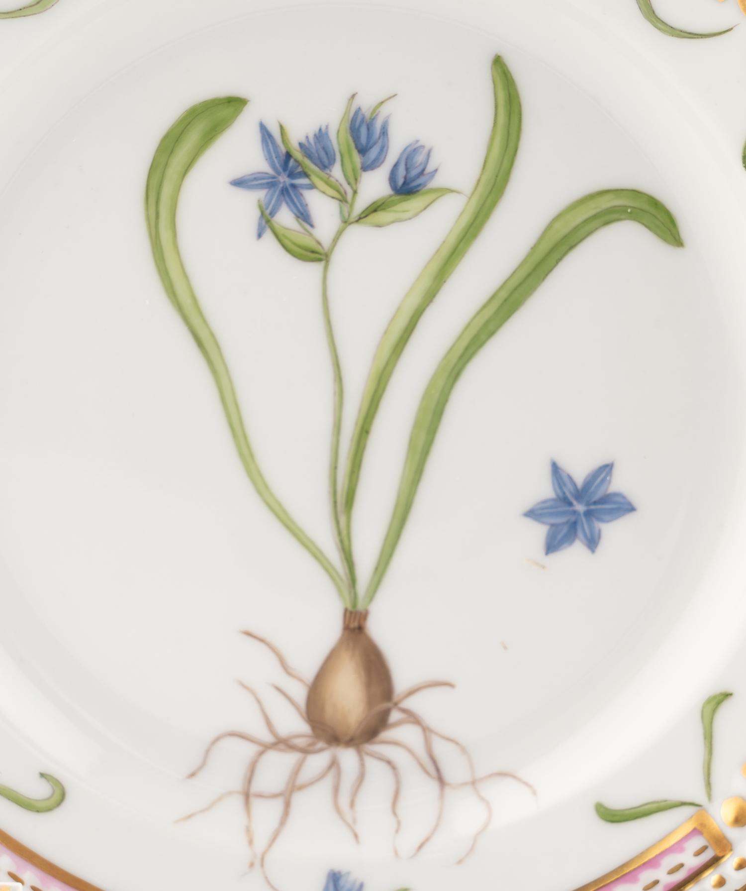 A Set of Eight Royal Copenhagen Flora Danica Porcelain Bread Plates