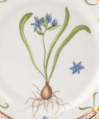 A Set of Eight Royal Copenhagen Flora Danica Porcelain Bread Plates
