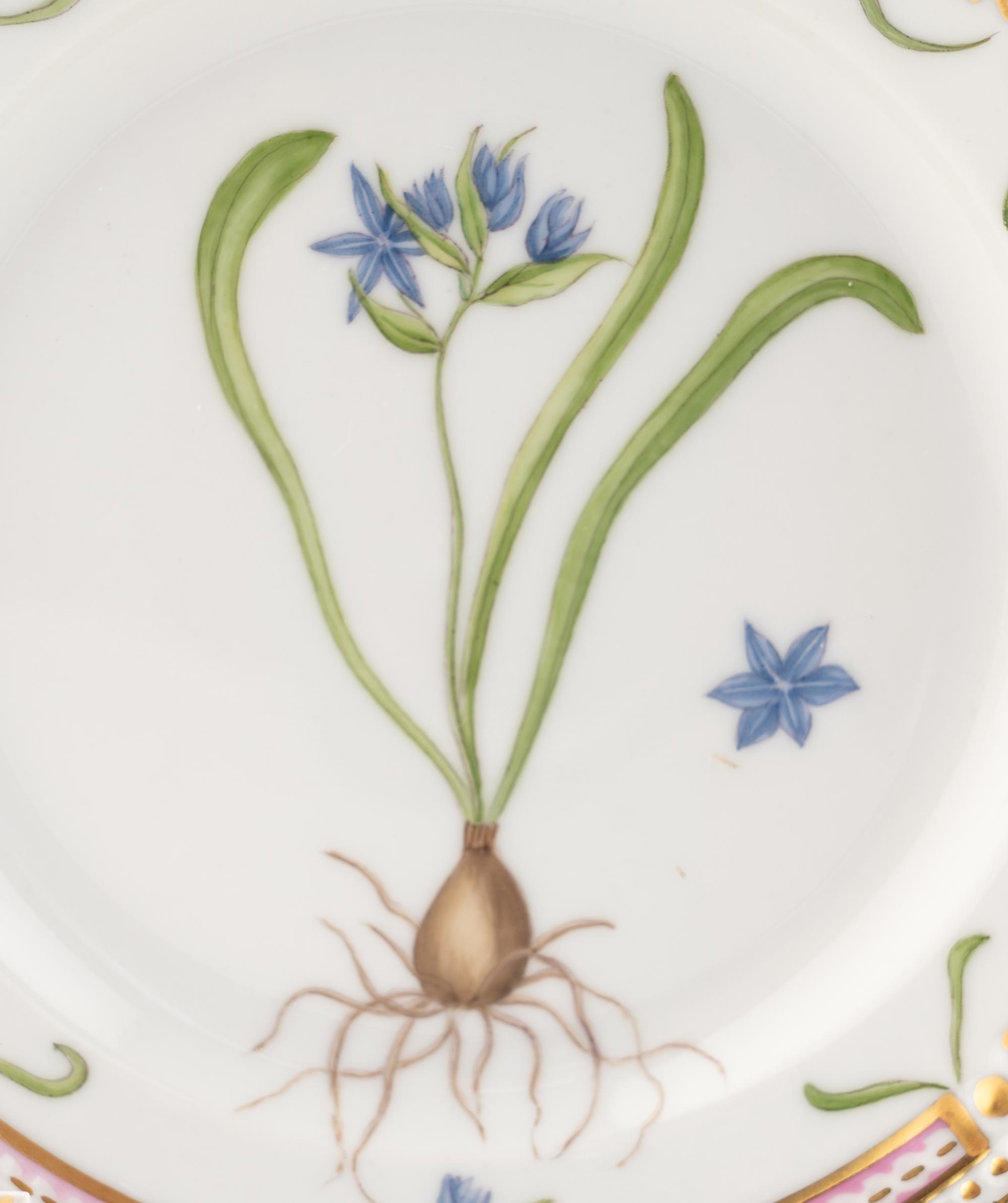 A Set of Eight Royal Copenhagen Flora Danica Porcelain Bread Plates