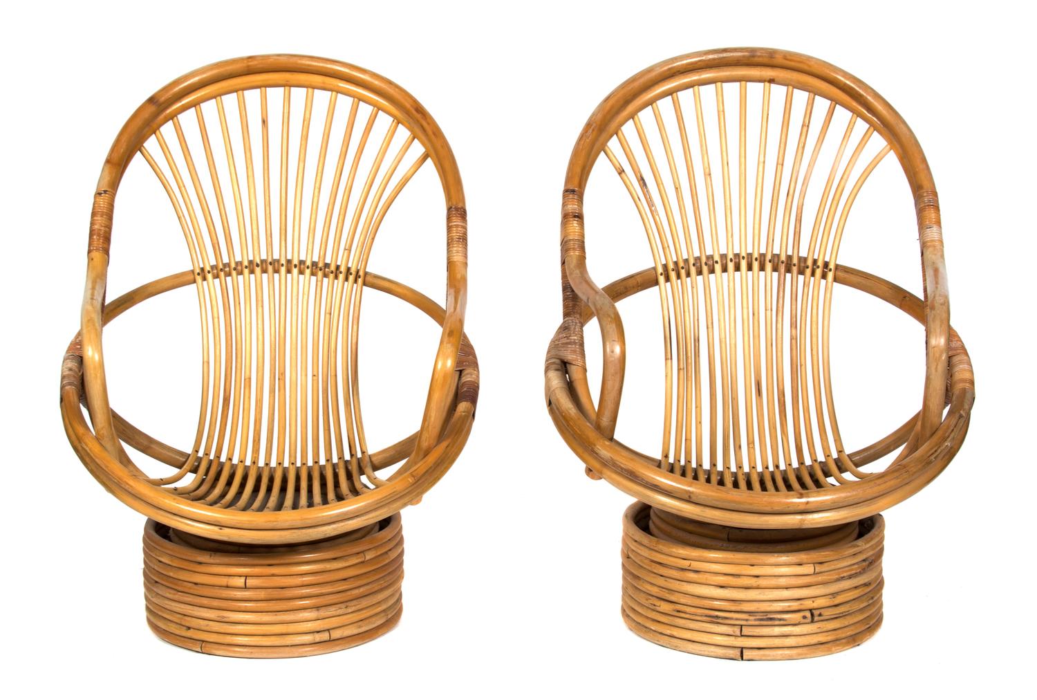 A Pair of Barrel-Back Rattan Armchairs on Swivel Bases Height 40 inches. — 20TH CENTURY