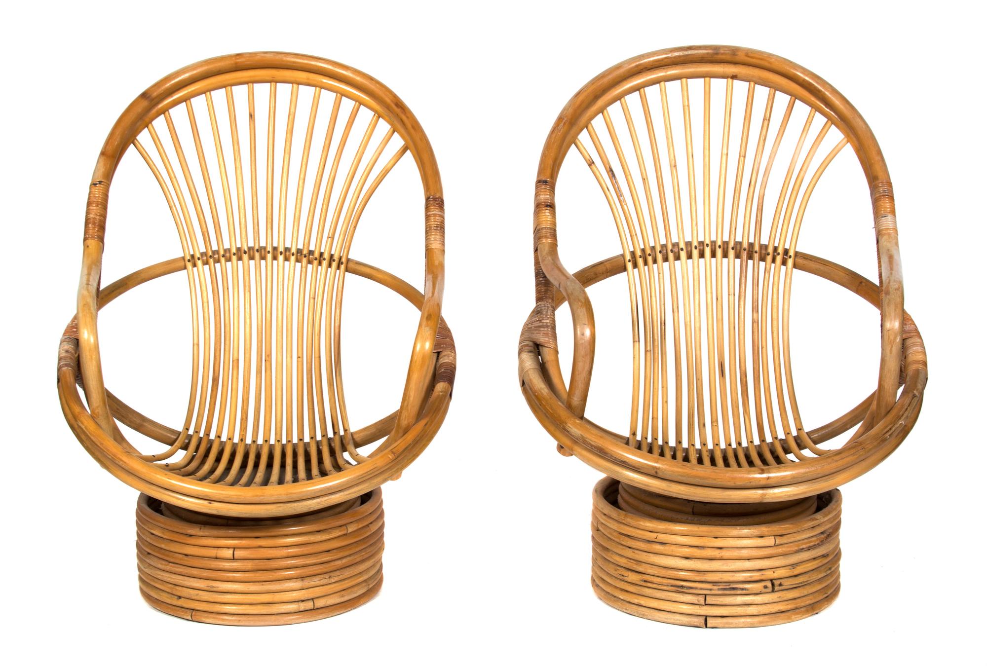 A Pair of Barrel-Back Rattan Armchairs on Swivel Bases Height 40 inches. — 20TH CENTURY