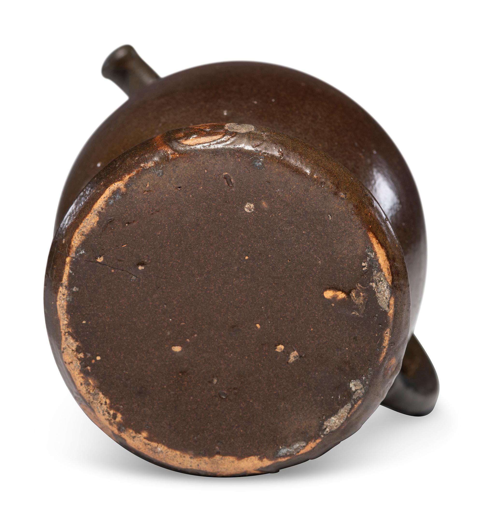 A Rare William Rowley Slip-Glazed Puzzle Jug