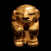 A Tairona Tumbaga Seated Female Figure