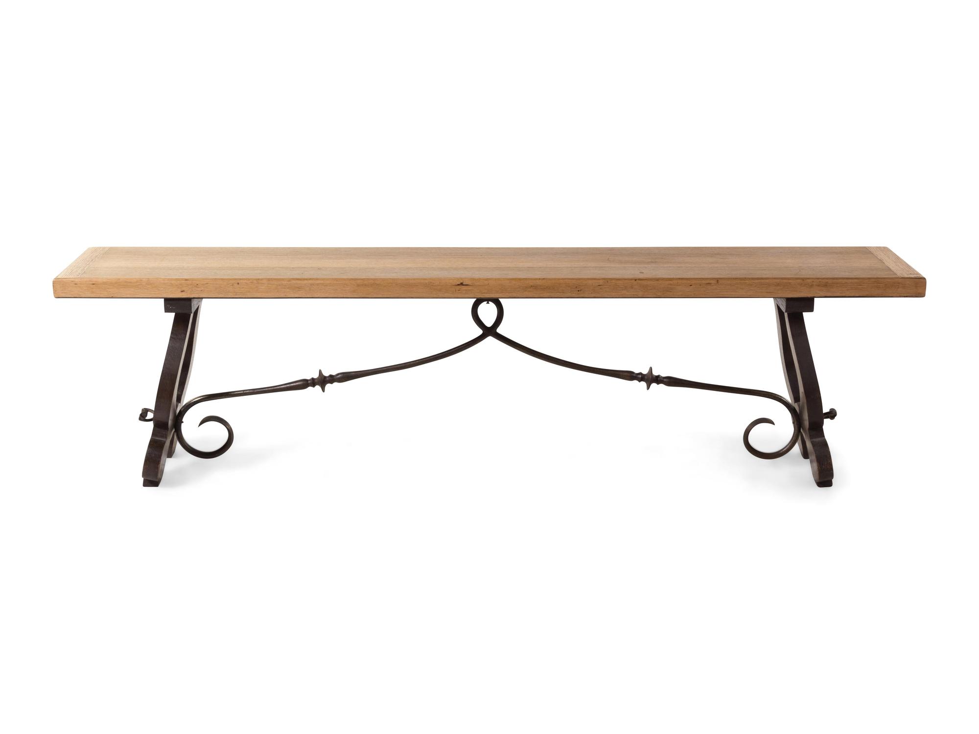 A Renaissance Revival Iron Mounted Trestle Bench