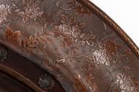 A Pair of Portuguese Embossed Leather Circular Mirrors