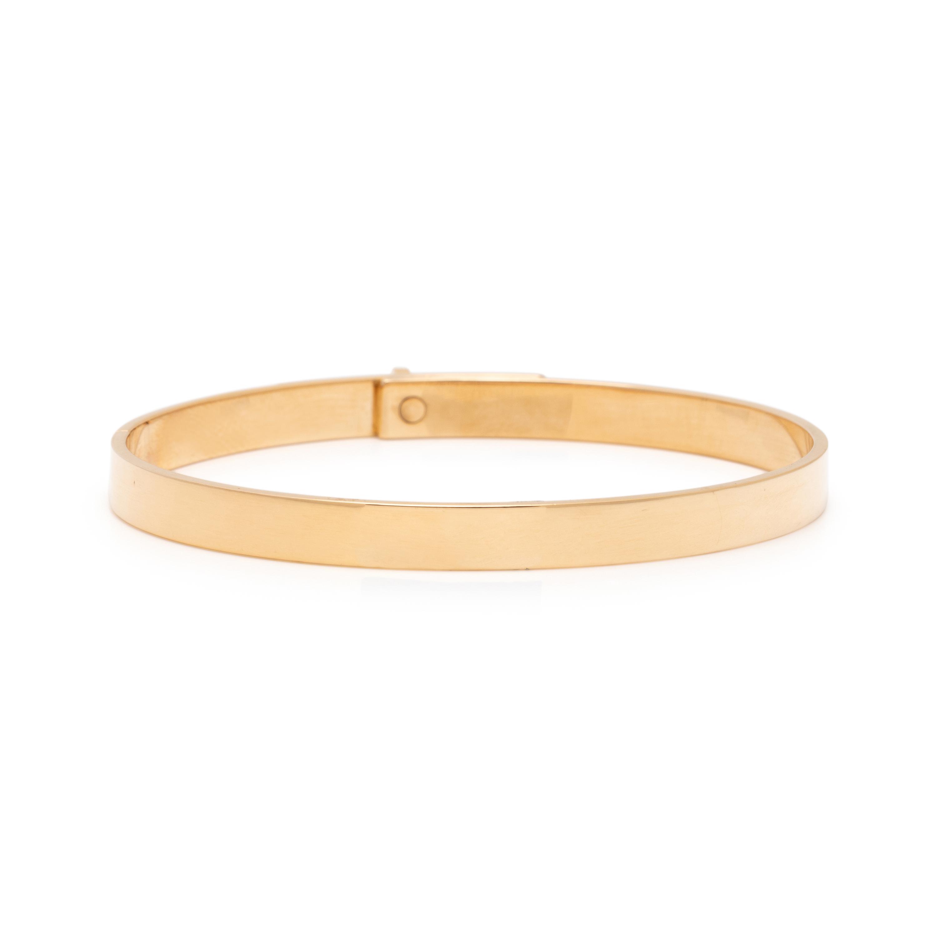 HERMÈS, YELLOW GOLD AND DIAMOND 'KELLY' BANGLE BRACELET