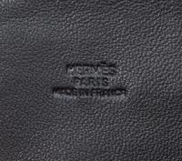 An Hermes Noir Agneau Crossbody Travel Pouch, 8" x 6" x .5".