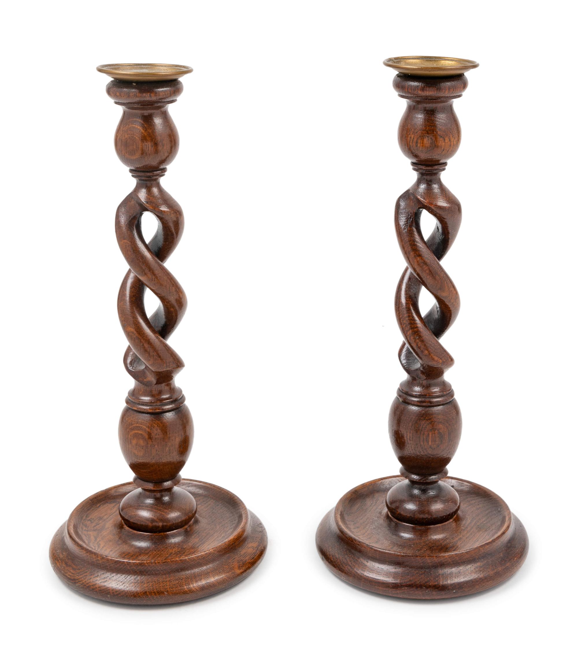A Pair of English Turned Oak Candlesticks