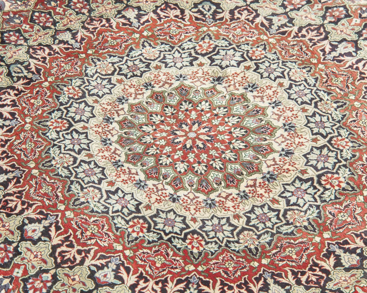 An Isfahan Wool and Silk Composite Rug
