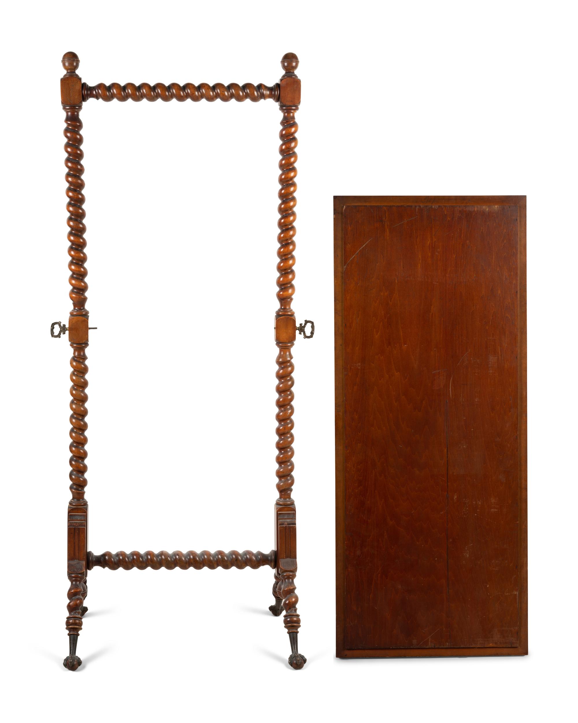 A Louis Philippe Carved Mahogany Cheval Mirror