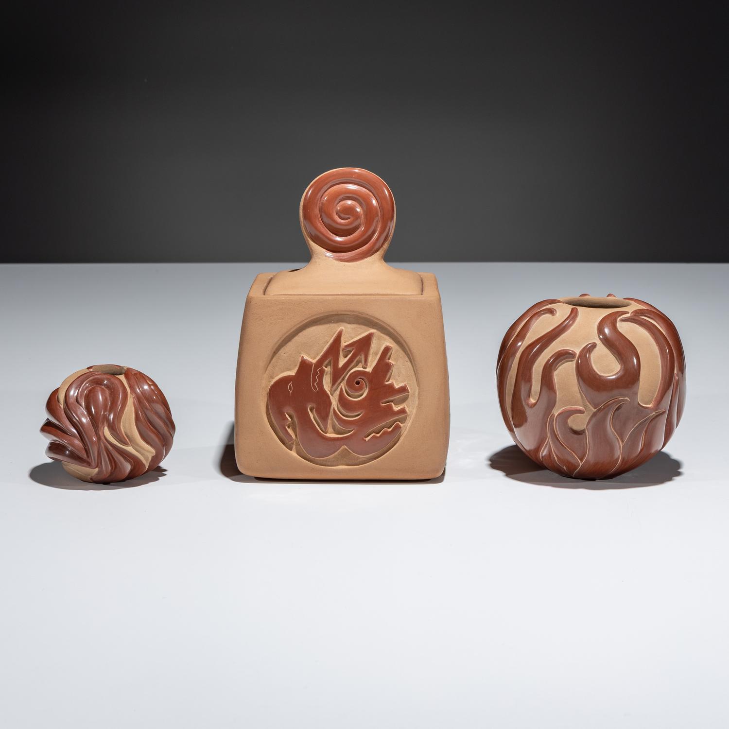 Carved Red and Tan Pottery