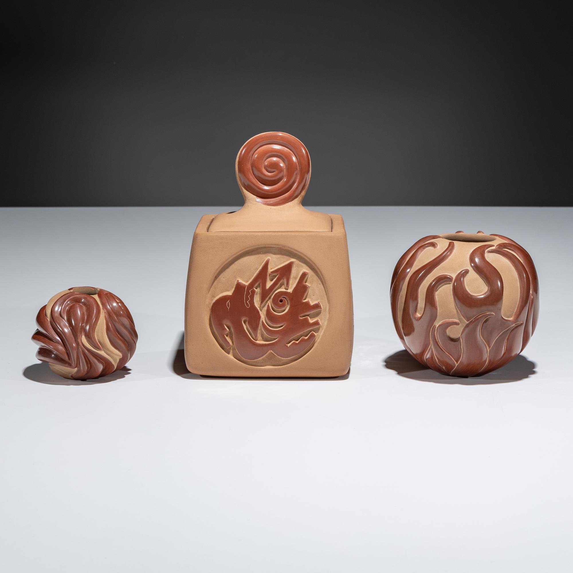 Carved Red and Tan Pottery