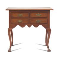 A Queen Anne Carved Walnut Spanish-Foot Dressing Table