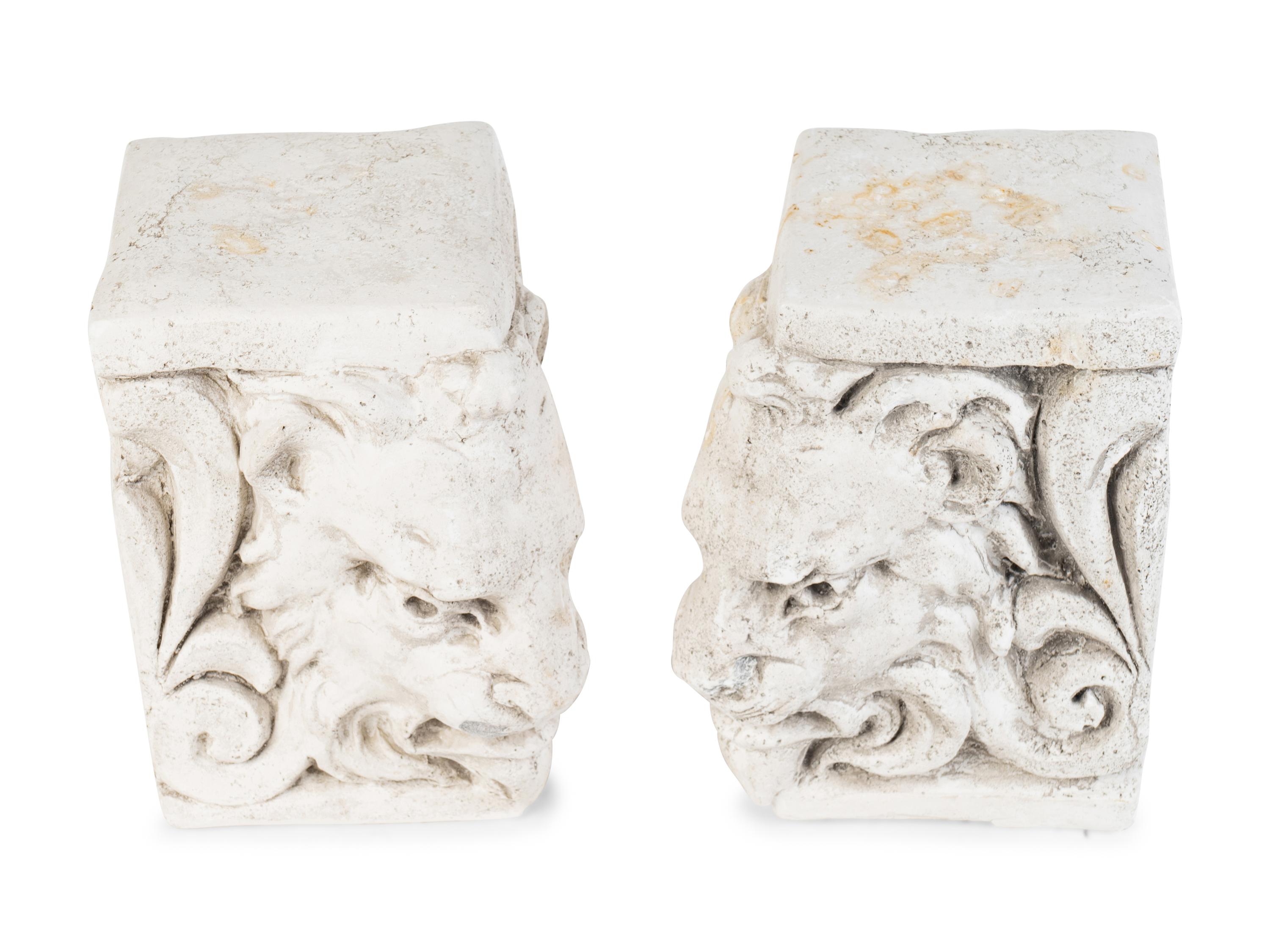 A Pair of White Ceramic Lion's Head Block-Form Bookends — 20TH CENTURY