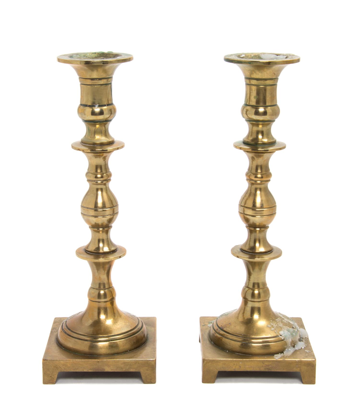 A Pair of Brass Candlesticks Height 9 3/4 inches. — 20TH CENTURY