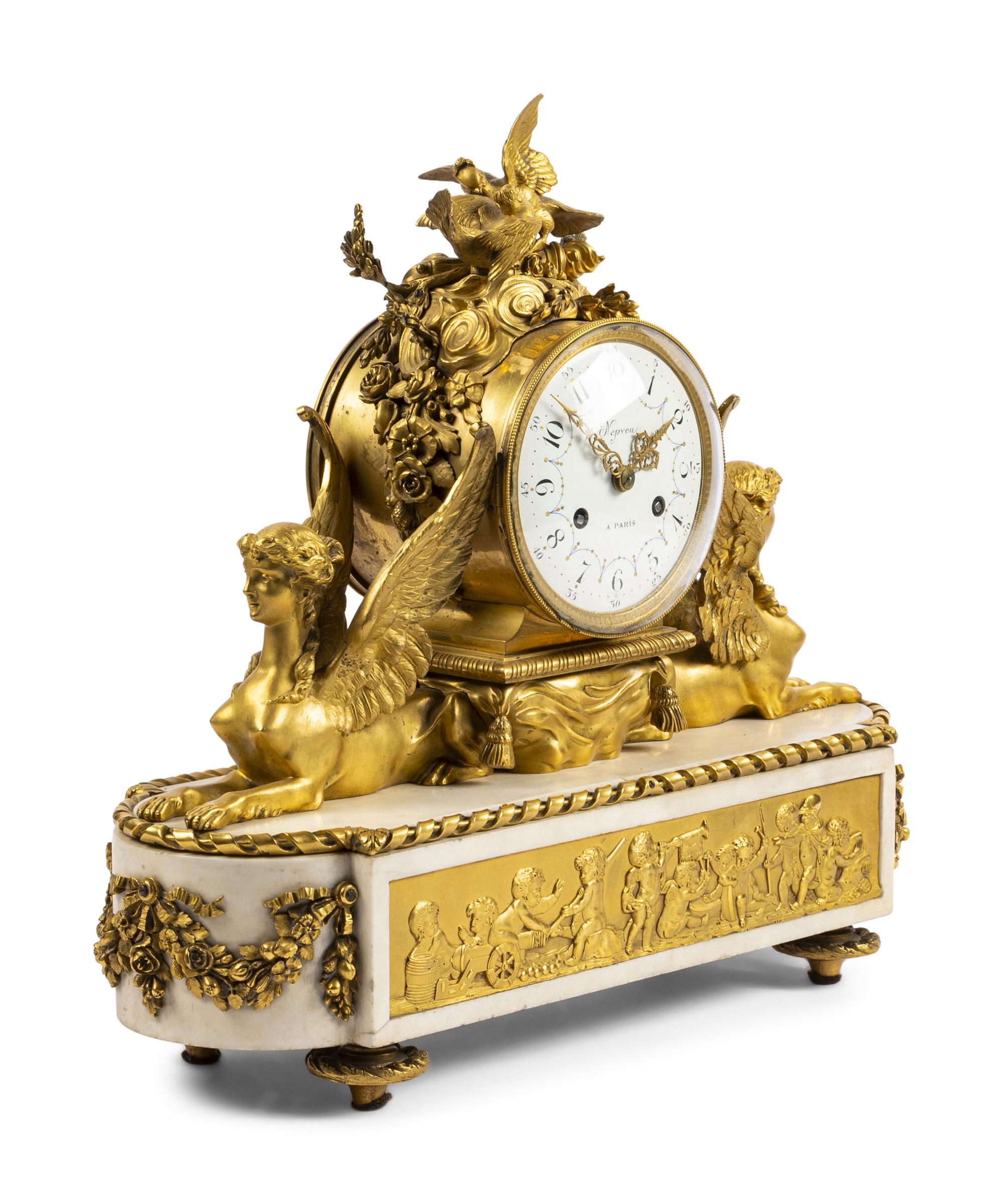 An Empire Gilt Bronze and Marble Mantel Clock
