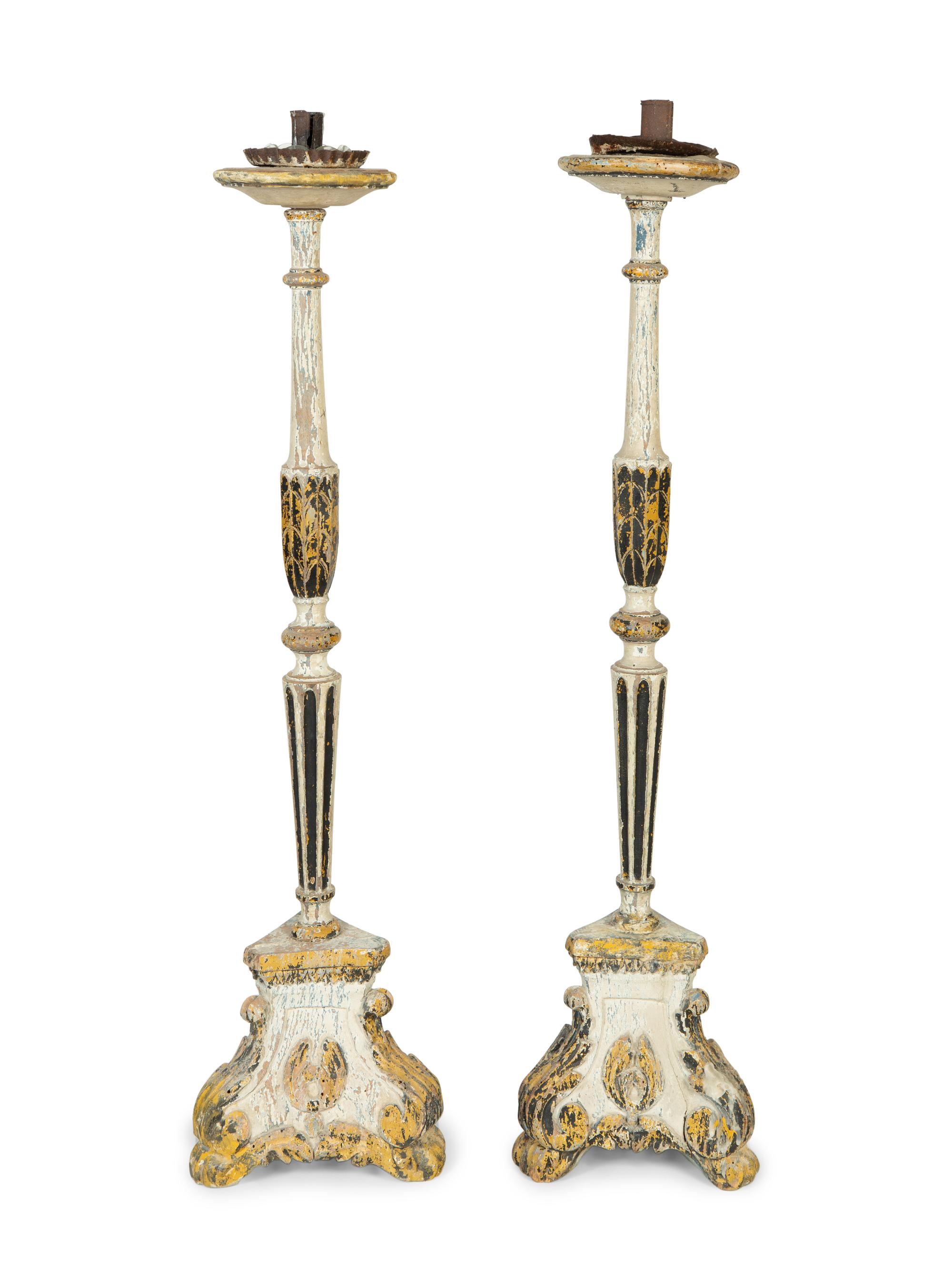 A Pair of Continental Painted Prickets