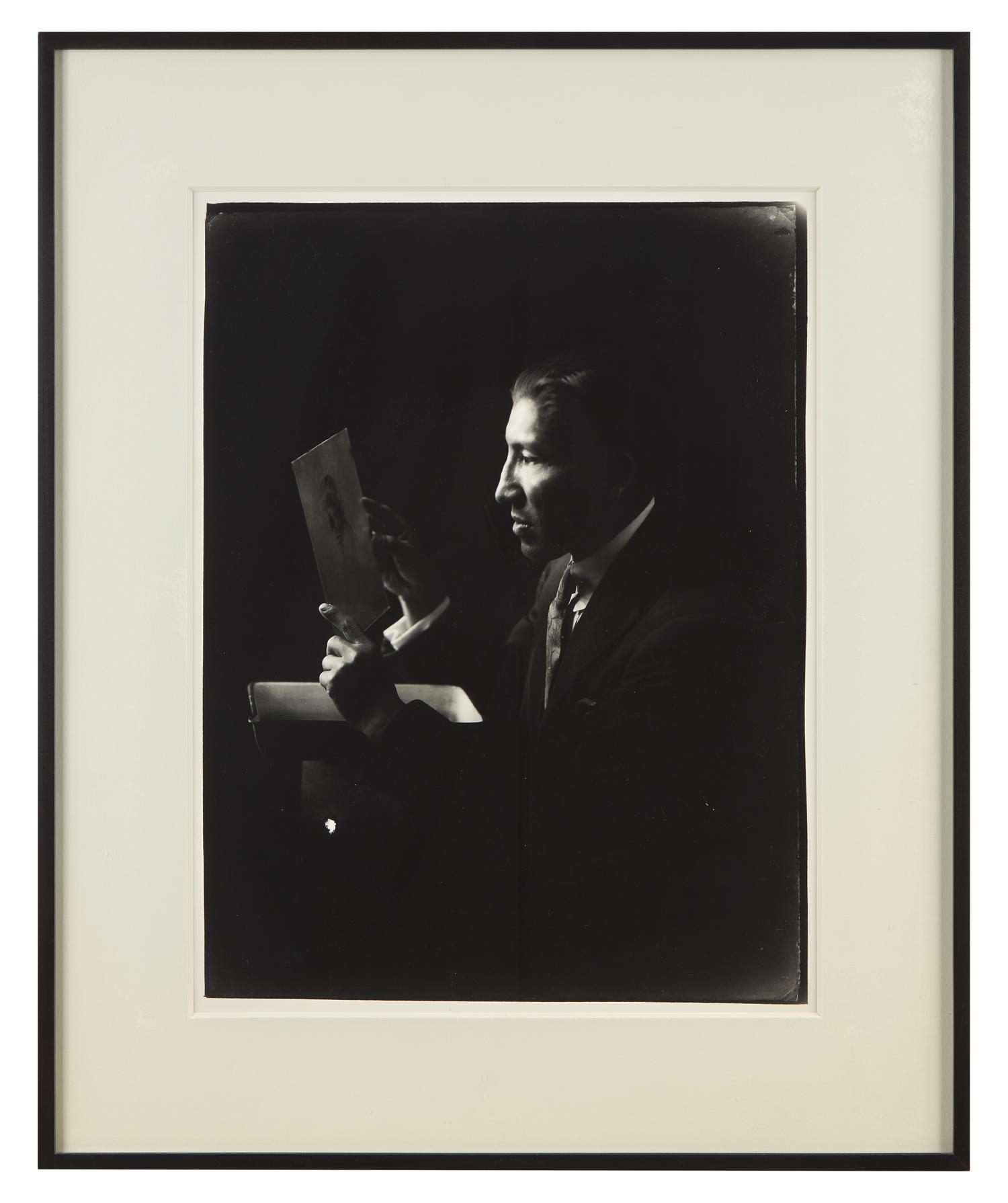 A Group of Three Photographs