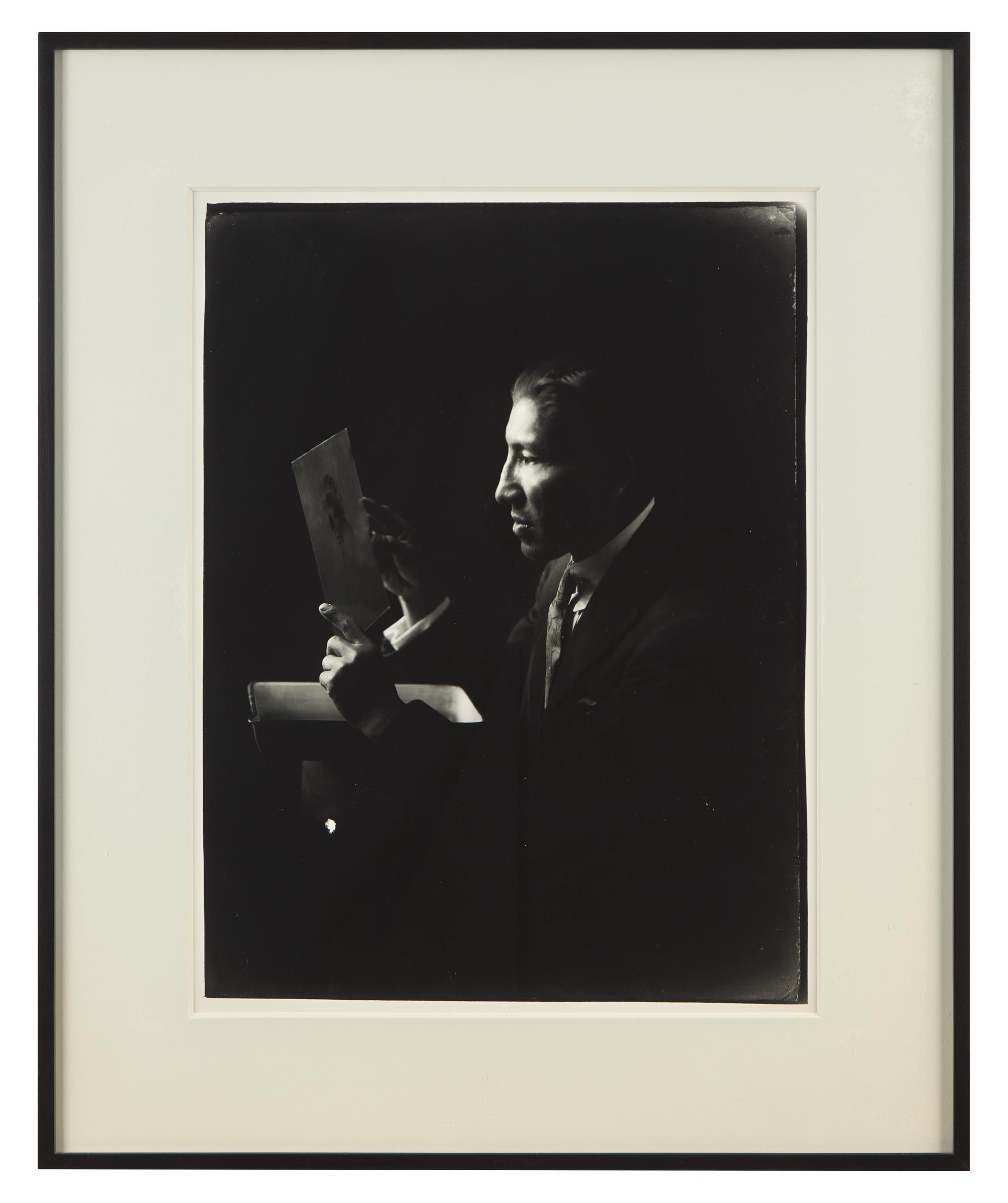 A Group of Three Photographs