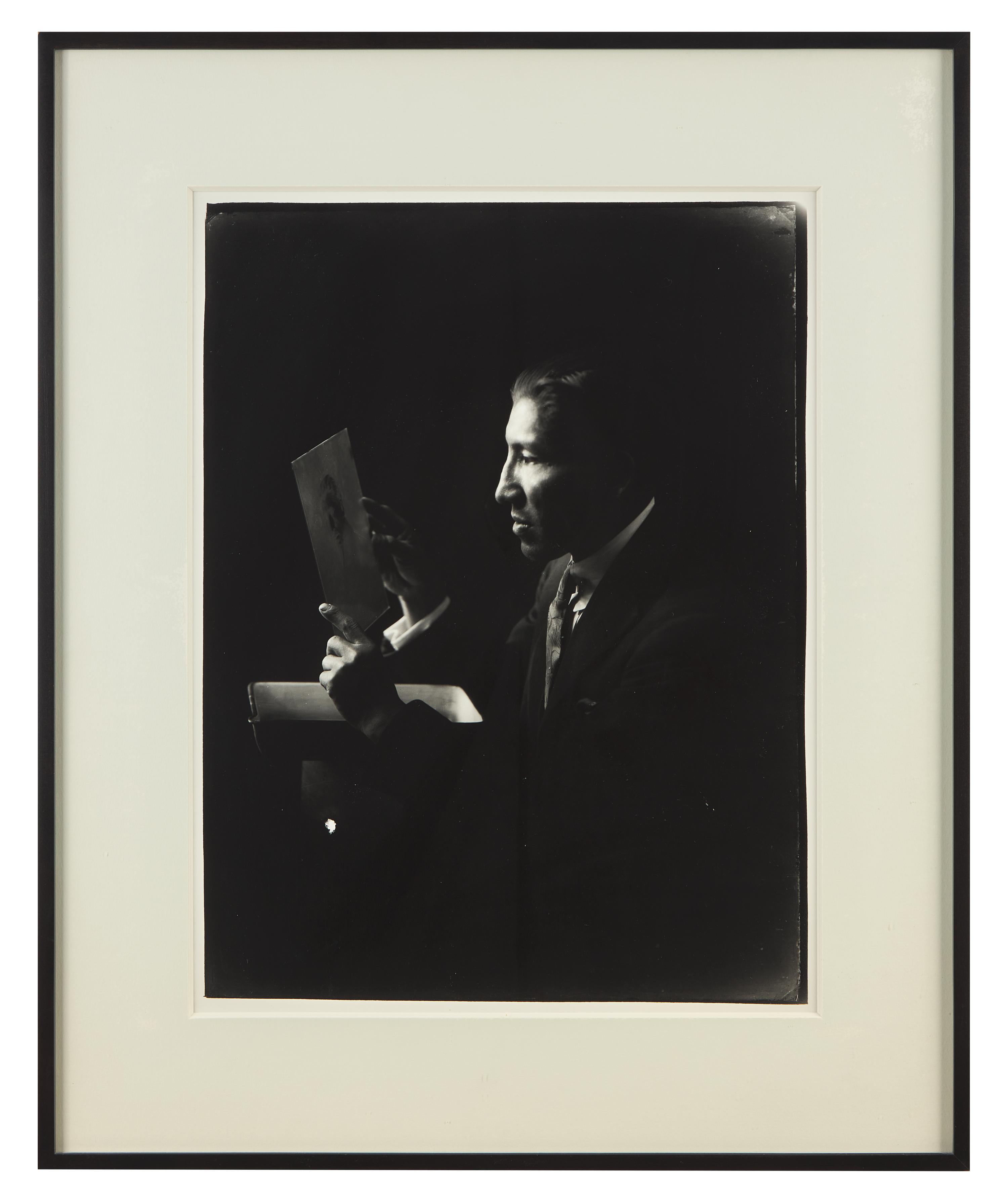 A Group of Three Photographs