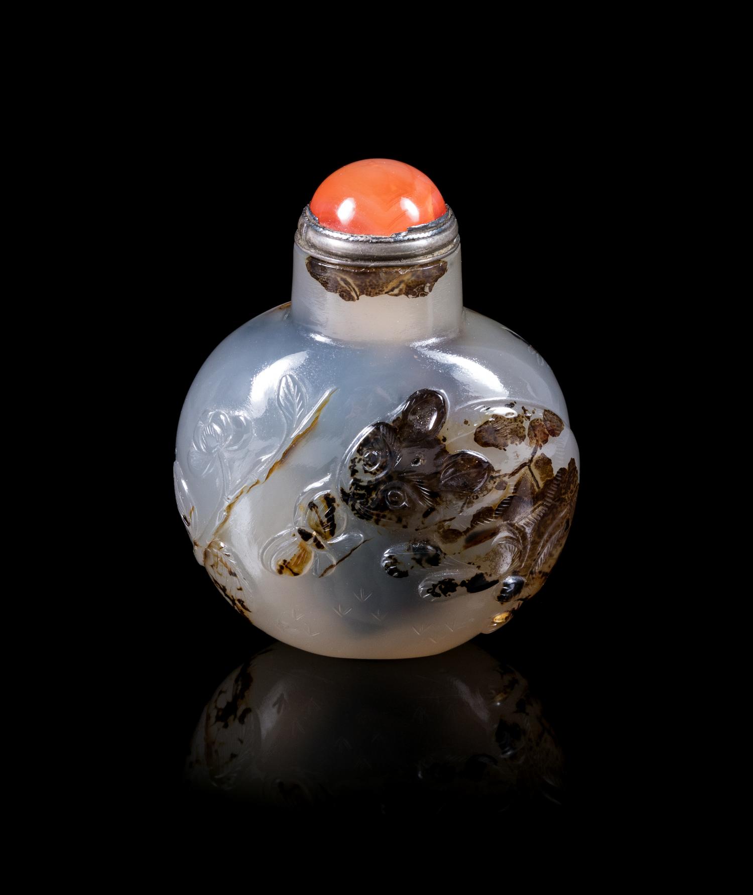 A Carved Black and Grey Agate Snuff Bottle Height overall 2 1/8 inches. — 19TH CENTURY